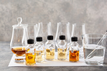 tasting bottles and glasses of whisky spirit brandy cognac. tasting at home