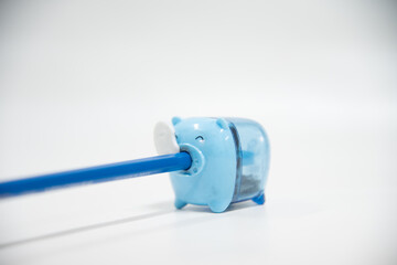 Blue pencil and blue pig.