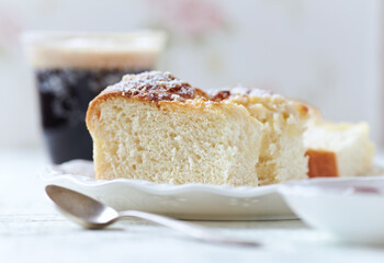 Simple yeast cake on bright background. Close up.	