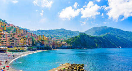 Camogli town in Liguria, Italy. Scenic Mediterranean riviera coast. Historical Old Town Camogli with colorful houses and sand beach at beautiful coast of Italy.