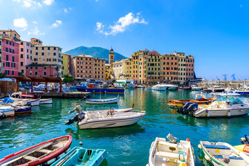Camogli town in Liguria, Italy. Scenic Mediterranean riviera coast. Historical Old Town Camogli with colorful houses and sand beach at beautiful coast of Italy.