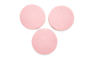 Sausage cut into three pieces. Sliced sausage isolated on white background. Fresh cut boiled pieces. Top view.