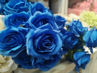 Dark blue Rose handmade Beautiful Artificial bouquet flowers decoration ornamental background in vintage classic tone color for greeting card or celebration fabric and plastic, Valentine Day, love