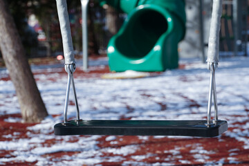 Empty playground for children, during the pandemic with the SARS cov 2 virus, in the cold season.