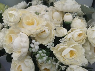 White Rose handmade Beautiful Artificial bouquet flowers decoration ornamental background in vintage classic tone color for greeting card or celebration event design Retro fabric plastic, Valentine