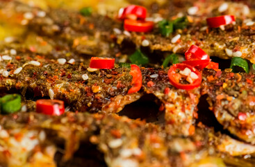 Asian cuisine seafood chili grilled small yellow croaker