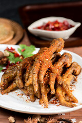 Spiced chilli chicken feet