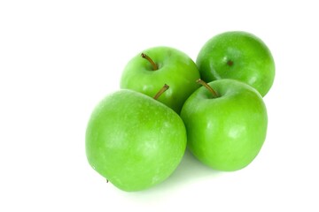 Fresh organic green apples isolated on white background. Healthy foods.