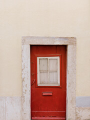 Fototapeta na wymiar Old Red Door | Lisbon Portugal Architecture | Pastel Tones