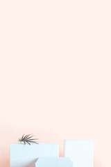 White empty podium stands on neutral beige background.