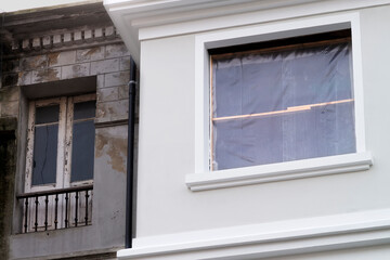 Fototapeta premium senior man farmer picking tomatoes in organic tomato garden