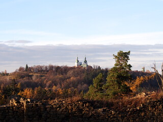 view from the medieval castle in the forest in the autumn afternoon, sunny cold day, wild nature, adventure trip, family travel,