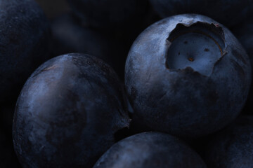 blueberries on a wooden background close up macro