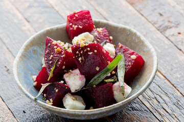 Beet salad. Classic Italian salad with beets, mozzarella, spinach, arugula, Parmesan cheese, olive oil, lemon juice, salt and pepper. A Fine dining restaurant classic.