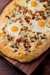 Flatbread pizza with meatballs, marinara sauce, Parmesan cheese and fresh Italian parsley. Classic American or Italian restaurant favorite. Homemade pizza dough with sauces, meats and cheeses.