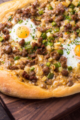 Flatbread pizza with meatballs, marinara sauce, Parmesan cheese and fresh Italian parsley. Classic American or Italian restaurant favorite. Homemade pizza dough with sauces, meats and cheeses.