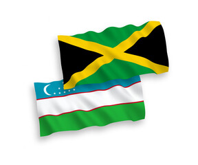 National vector fabric wave flags of Jamaica and Uzbekistan isolated on white background. 1 to 2 proportion.