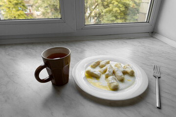 Closeup of dumplings with cottage cheese or Dumplings without filling - slavic light dish, vegetarian food, healthy breakfast