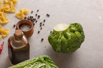 Broccoli on kitchen table of vegetarian cuisine, close up