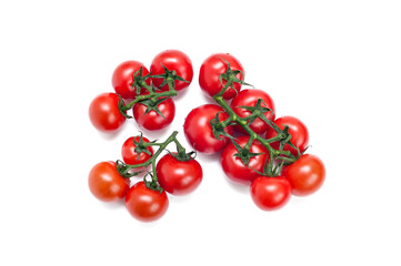  Branch of fresh red tomatoes on a white background.
