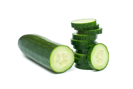  Cucumber. Stack Of Cucumber Slices Over White Background