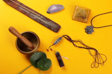 Tibetan dzi bead amulet necklace, tibetan singing bowl and other Success and prosperity symbols on...