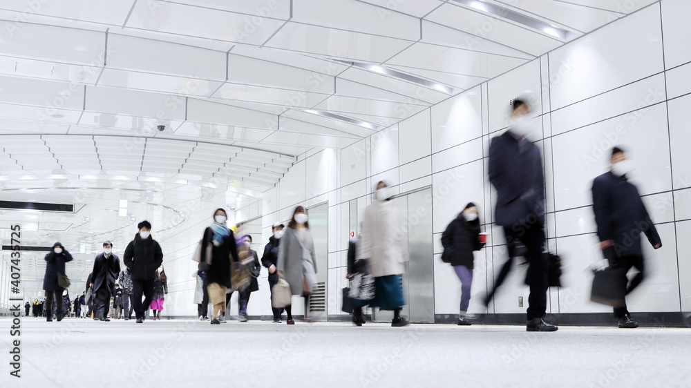 Wall mural crowd of people walking on the street in tokyo, japan