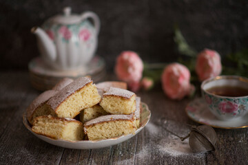 Still-life. Cake with a tea set.