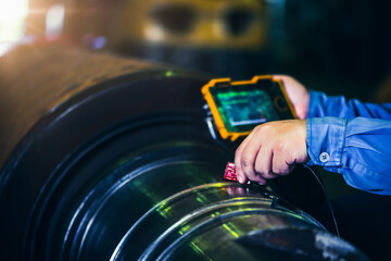 UT, Ultrasonic test to detect imperfection or defect in steel roller in the factory, NDT Inspection.