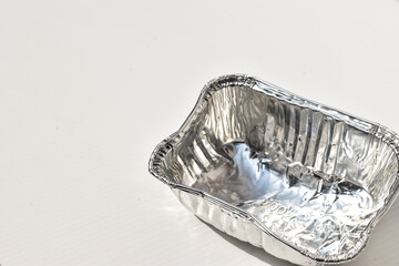 aluminum foil tray on white background with copy space