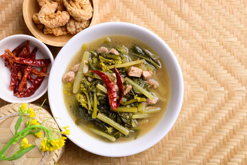 Northern Thai food (Pak Kad Jor), Sour soup Thai flowering bok choy with pork eating with dry chili, pork rind and sticky rice
