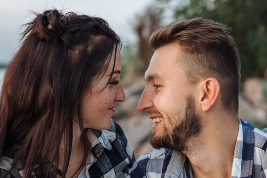 Close up of smiling young couple in love.