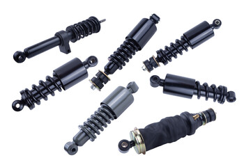 Black shock absorber for trucks on a white background with a cut-off track.
