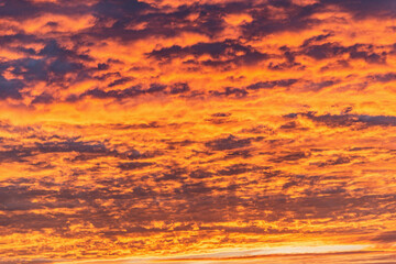 Amazing colorful clouds on the evening sunset sky.