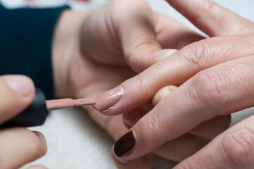 Obraz na płótnie Canvas nail care in spa or beauty salon, macro photography