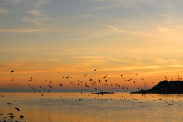 Beautiful sunset over the sea in Stobrec, small town near Split, Croatia.