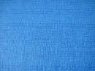 blue fabric texture background. simple linen textured backdrop in bright blue colors.