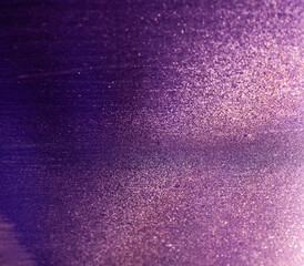 Abstract purple background with many small sparkles. Gradient from dark to light