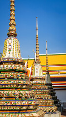 Beautiful Pagoda or Chedi decorated with old ceramic in the temple in Thailand. Wat Phra Chettuphon( Wat Pho)