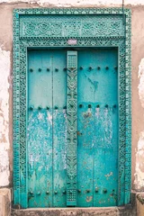 Stickers fenêtre Zanzibar Porte bleu-vert d& 39 une maison à Stone Town, Zanzibar