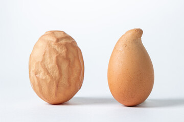 Deformed chicken eggs. Chicken eggs on a white background.