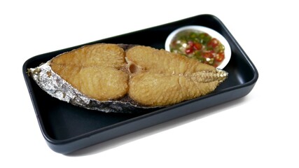 Thai food, Deep fried Mackerel filet served with chilli  sauce isolated on white background