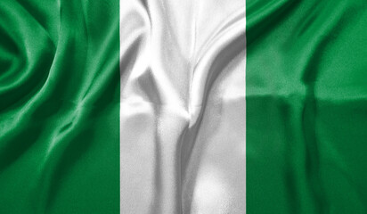 Obraz premium Nigeria flag wave close up. Full page Nigeria flying flag. Highly detailed realistic 3D rendering