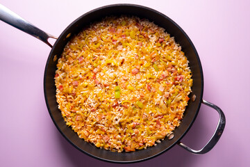 Traditional paella with vegetables and iberico ham