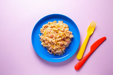 Traditional paella with vegetables and iberico ham