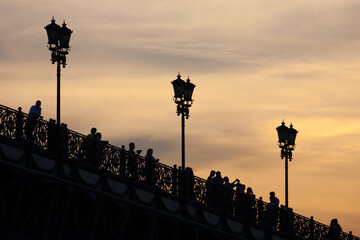The silhouette of the Patriarch's Bridge at sunset in Moscow. Russia - 407463110