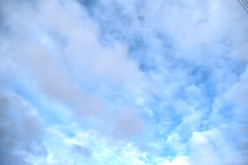 white clouds on a blue sky background