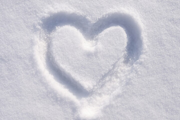 Heart shape on the snow. Love and devotion concept