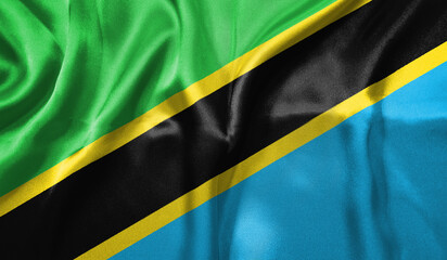 Tanzania flag wave close up. Full page Tanzania flying flag. Highly detailed realistic 3D rendering