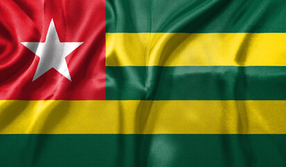 Togo flag wave close up. Full page Togo flying flag. Highly detailed realistic 3D rendering